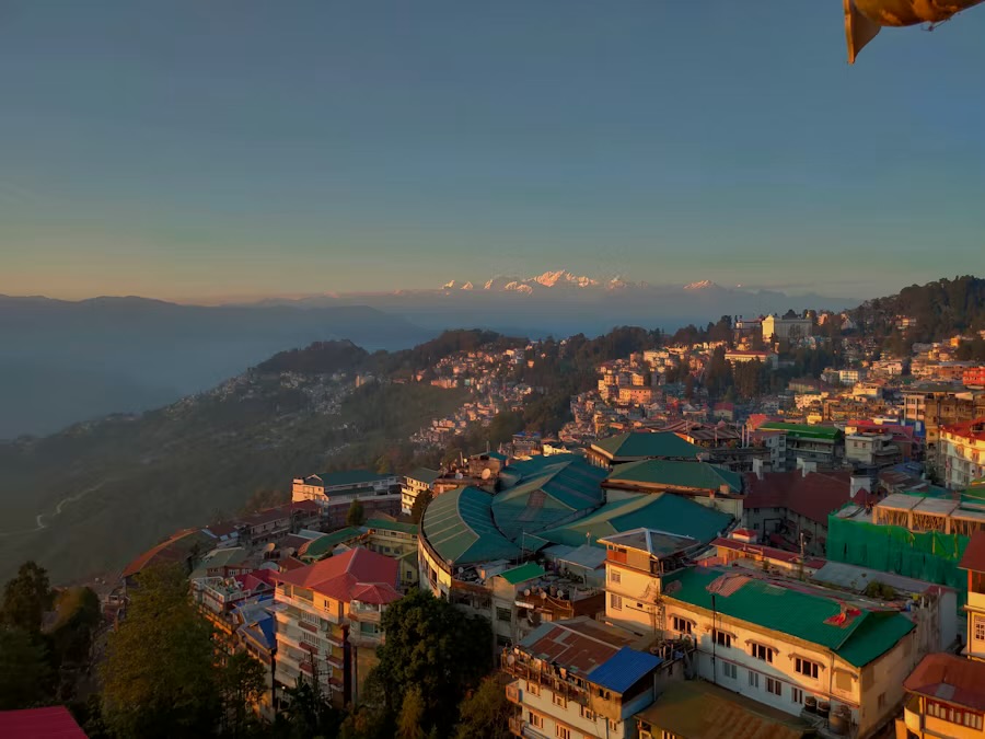 Darjeeling town at dawn with the Khangchendzonga range on the horizon